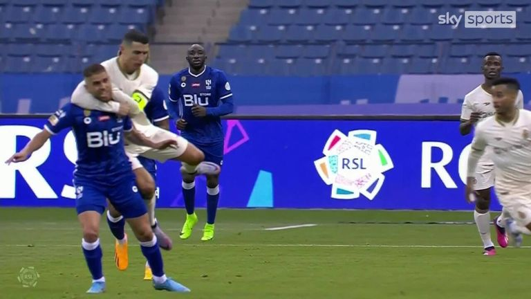 Cristiano Ronaldo receives yellow card for bringing down Al-Hilal player with a headlock