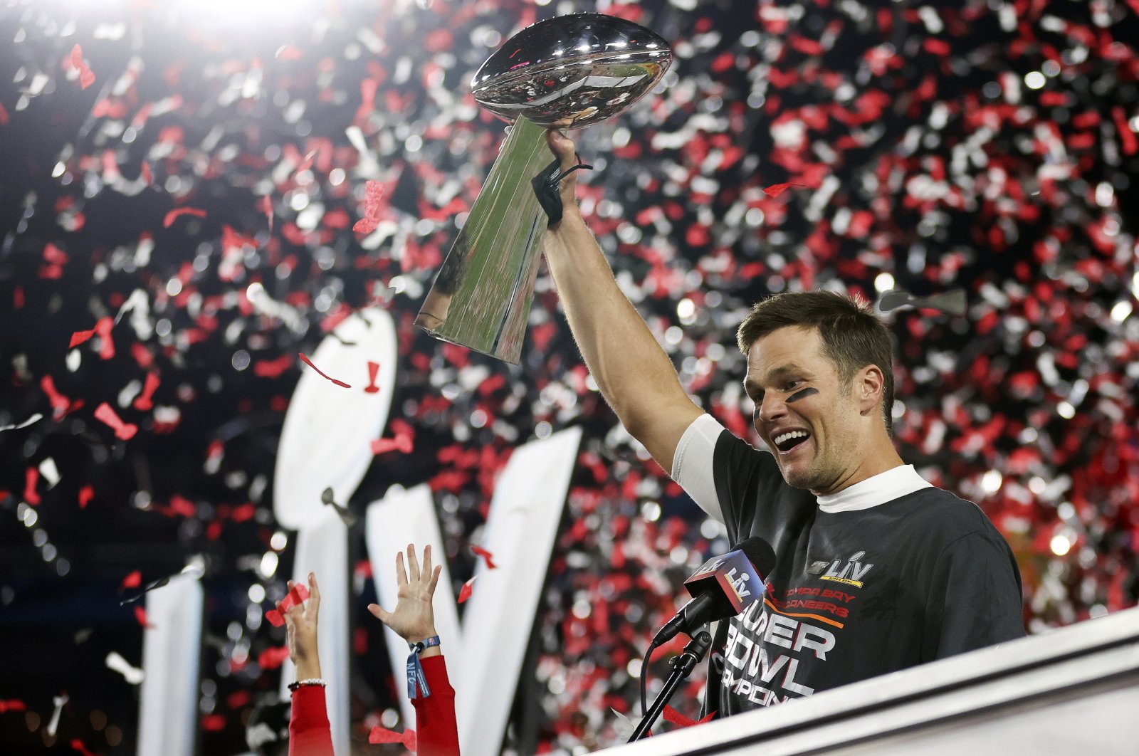Tom Brady with the NFL MVP Trophy